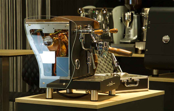 http://www.rawpluscoffee.com/cdn/shop/files/Nota-1-group-E61-professional-Orchestrale-coffee-machine-07_140a3e34-81e6-42bf-a157-64beffe7e2a9_grande.jpg?v=1685602295